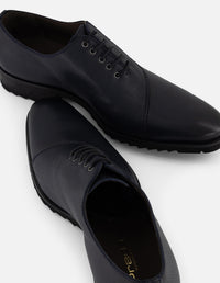 Zapato Oxford azul piel para hombre con corte asimétrico