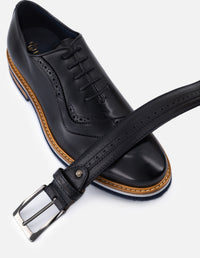 Cinturón en piel napa con picado color negro para hombre