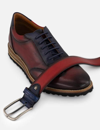 Cinturón rojo en piel para hombre con diseño de franjas