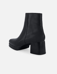 Botín en piel napa color negro para mujer