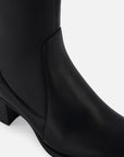 Botas de lycra en color negro para mujer.