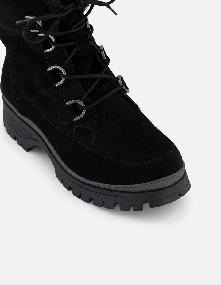Botin chelsea negro ante para mujer con interior sherpa