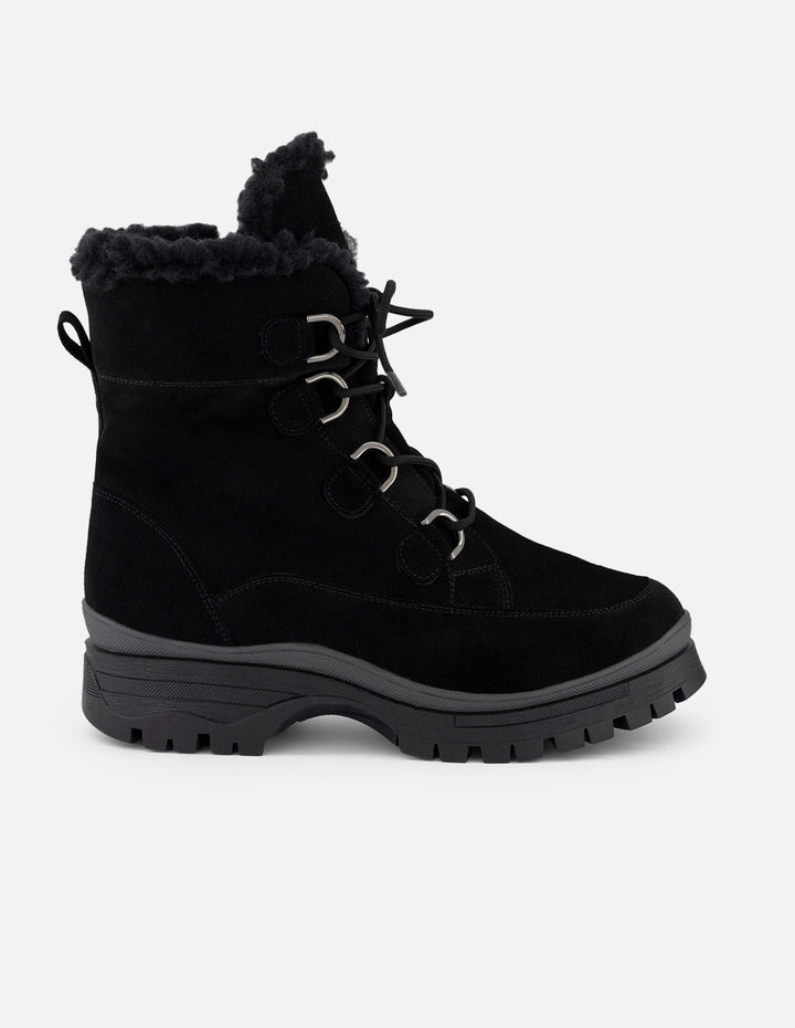 Botin chelsea negro ante para mujer con interior sherpa
