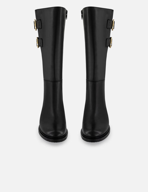 Bota negra piel de mujer con hebillas laterales en color dorado