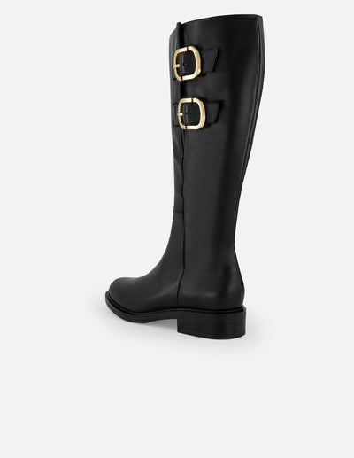 Bota negra piel de mujer con hebillas laterales en color dorado