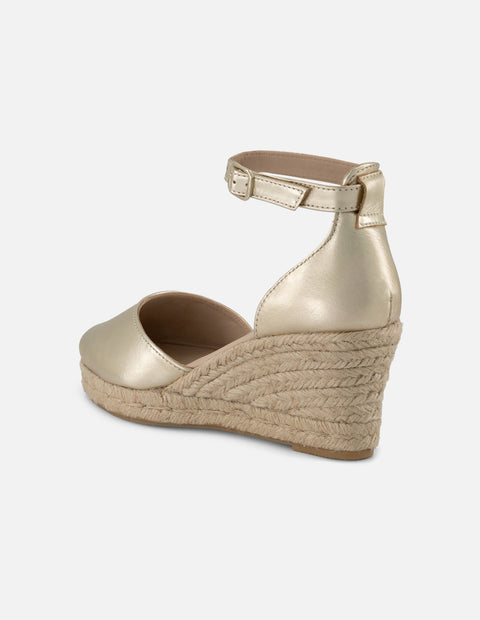 Alpargata cuña en yute color oro para mujer con acabado metalizado