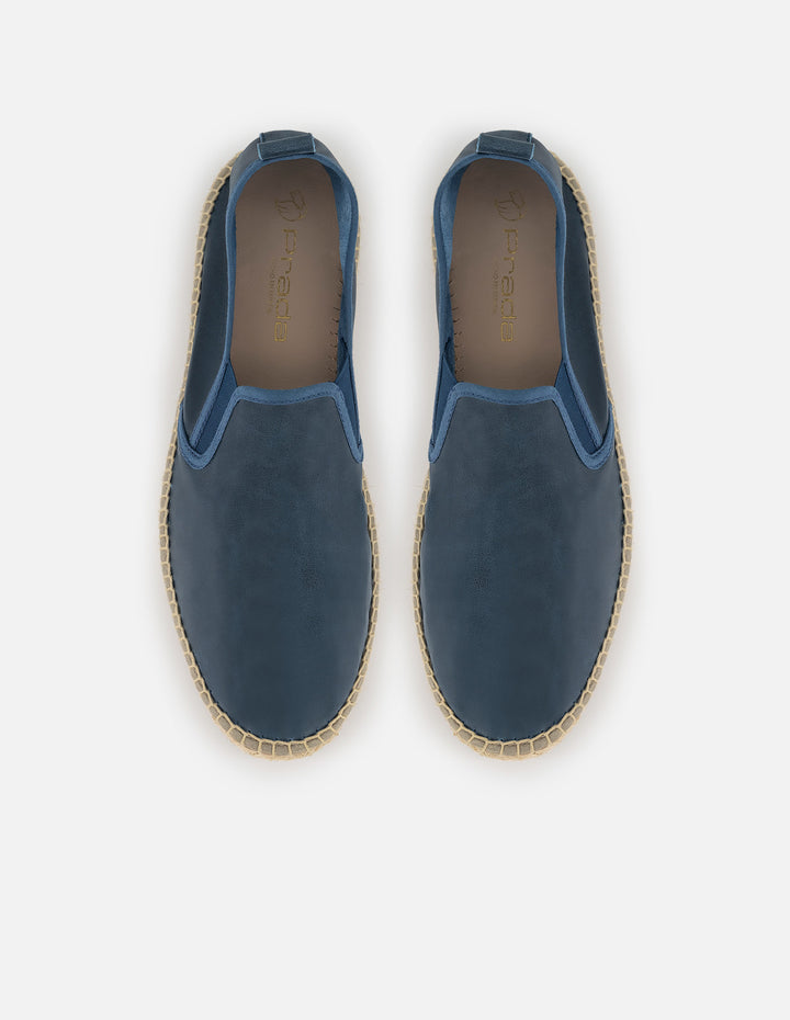 Alpargata azul en piel suave con elástico lateral para hombre