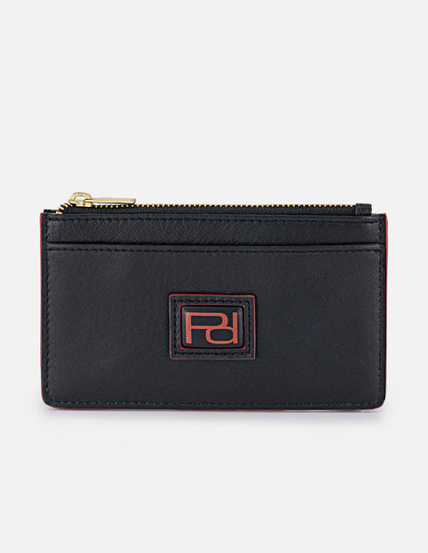 Monedero para mujer con detalles rojos y placa Pd