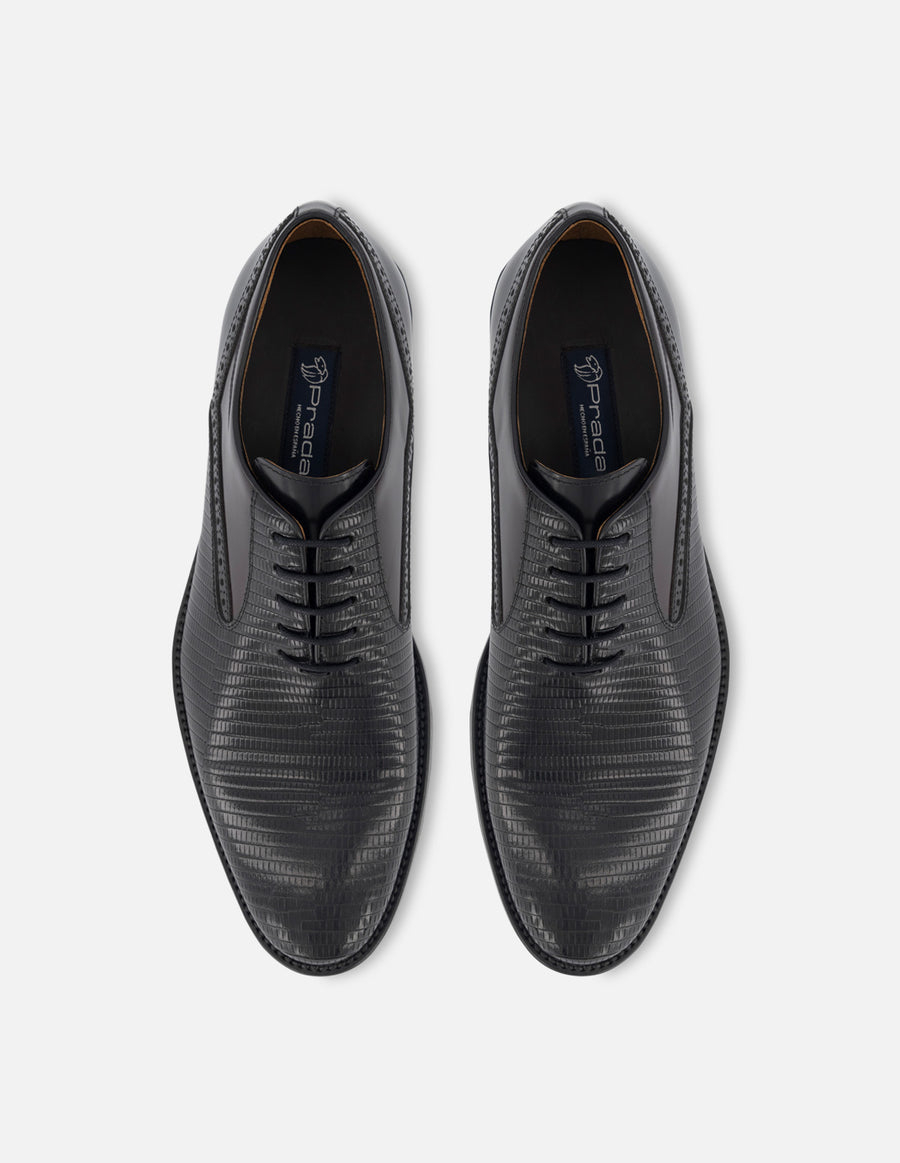 Oxford de piel color negro con detalles en grabado tipo tejus y florantik para hombre.