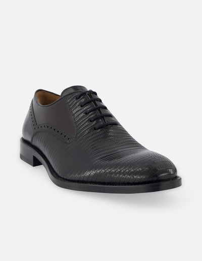 Oxford de piel color negro con detalles en grabado tipo tejus y florantik para hombre.
