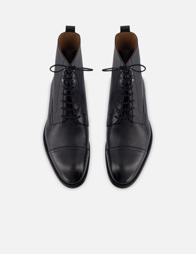 Botin de cordones en piel bombeada color negro  para hombre