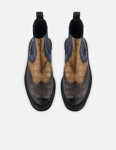 Botin chelsea de piel con  grabado tipo coco multicolor y detalle en picado María para hombre