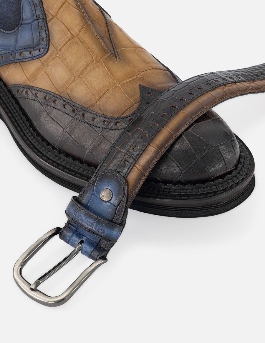 Botin chelsea de piel con  grabado tipo coco multicolor y detalle en picado María para hombre
