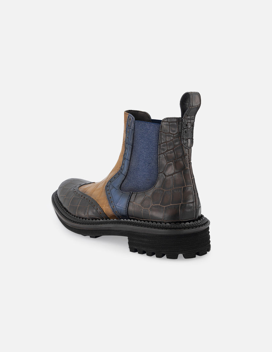 Botin chelsea de piel con  grabado tipo coco multicolor y detalle en picado María para hombre