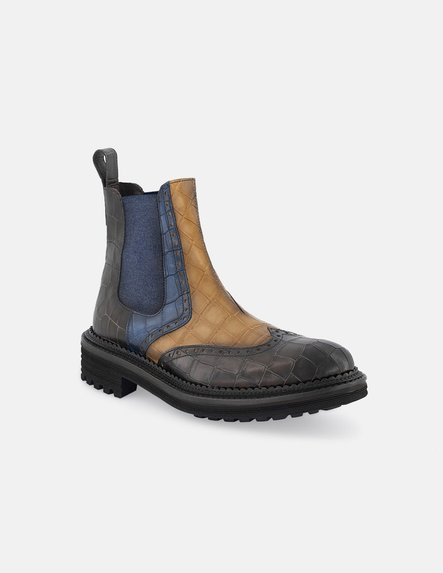 Botin chelsea de piel con  grabado tipo coco multicolor y detalle en picado María para hombre