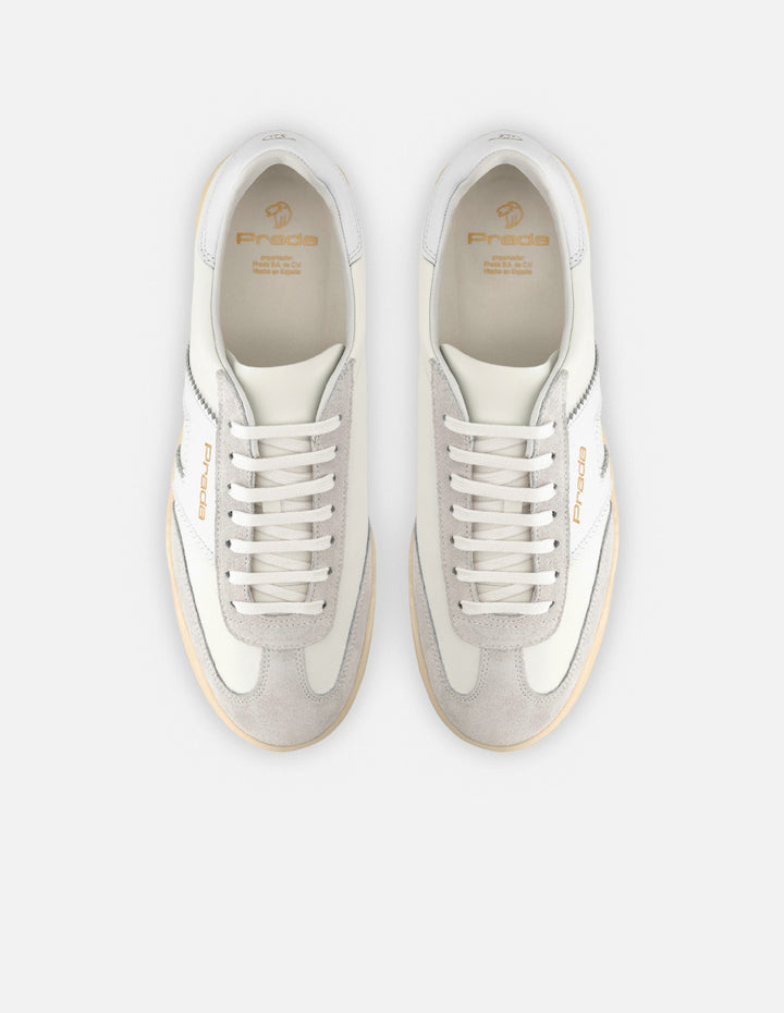Tenis en piel napa color blanco con detalles en piel ante para hombre