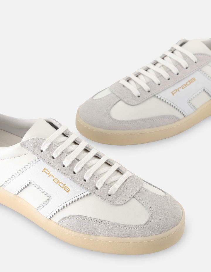 Tenis en piel napa color blanco con detalles en piel ante para hombre