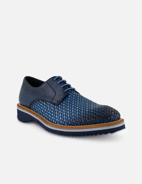 Zapato Blucher azul en piel trenzada para hombre con suela dentada