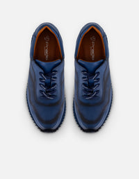 Tenis azules en piel para hombre con contraste marino