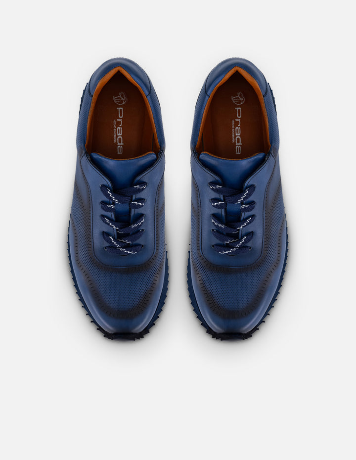 Tenis azules en piel para hombre con contraste marino