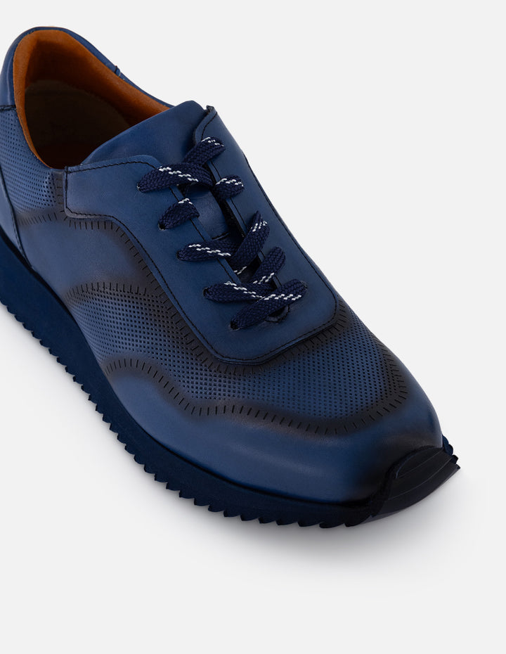 Tenis azules en piel para hombre con contraste marino