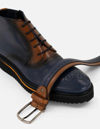 Botines azul de piel para hombre con picado María