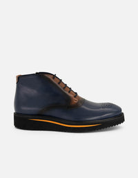 Botines azul de piel para hombre con picado María