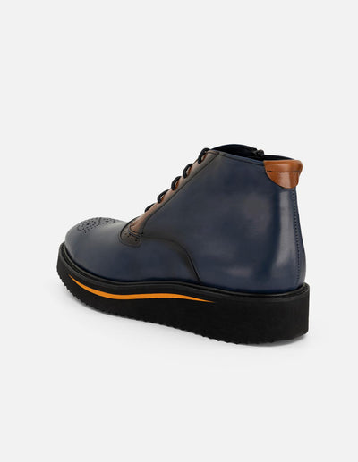 Botines azul de piel para hombre con picado María