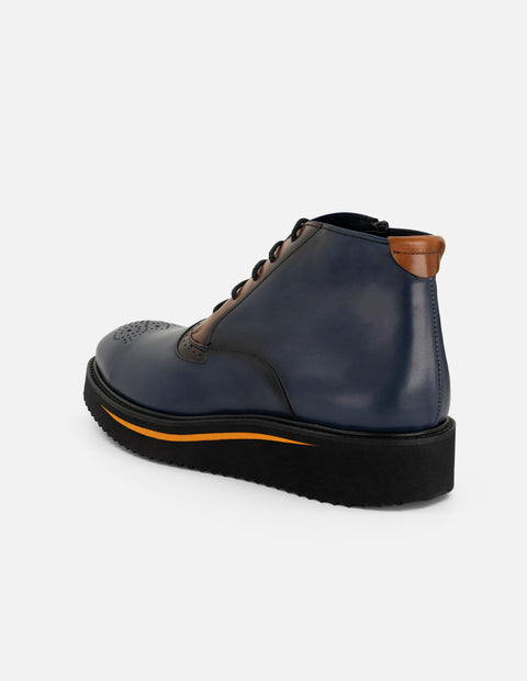 Botines azul de piel para hombre con picado María