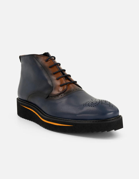 Botines azul de piel para hombre con picado María