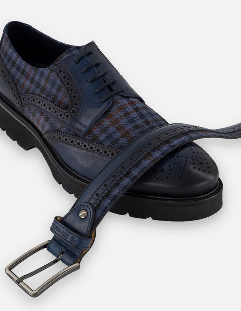 Cinturón azul piel y textil para hombre con picado frontal