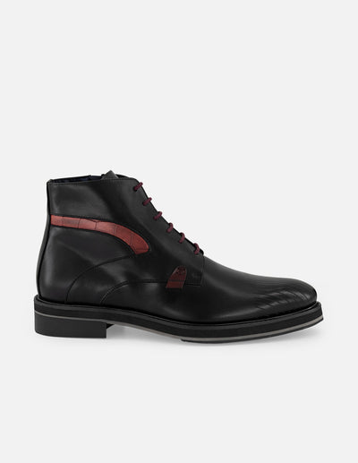 Botines negros de piel para hombre con detalle tipo coco