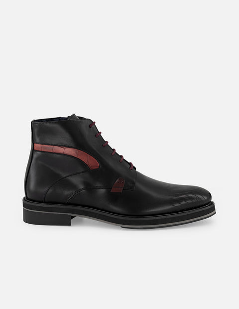 Botines negros de piel para hombre con detalle tipo coco