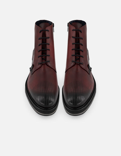 Botines vino de piel con detalle coco negro para hombre