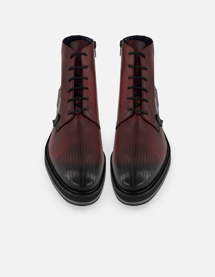 Botines vino de piel con detalle coco negro para hombre