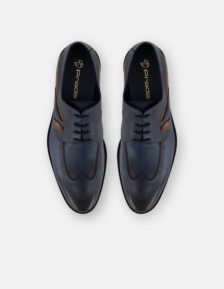 Zapato Blucher azul con grabado coco y sombreado para hombre