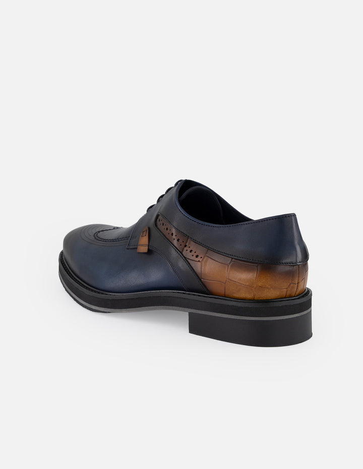 Zapato Blucher azul con grabado coco y sombreado para hombre