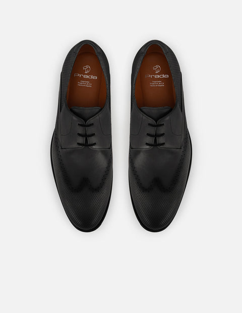 Zapato blucher con grabado picado en piel color negro para hombre