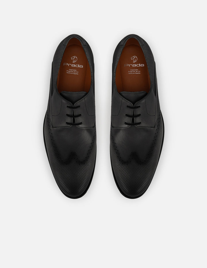 Zapato blucher con grabado picado en piel color negro para hombre