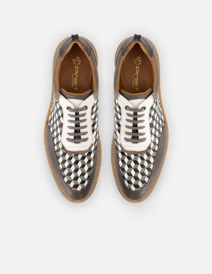 Oxford en piel napa trenzada color negro y blanco para hombre