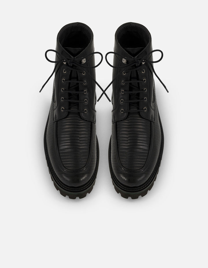 Botines negros de piel grabada tipo tejus para hombre con suela tipo combate