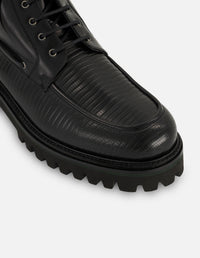 Botines negros de piel grabada tipo tejus para hombre con suela tipo combate