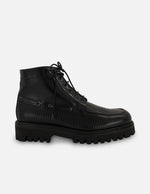 Botines negros de piel grabada tipo tejus para hombre con suela tipo combate