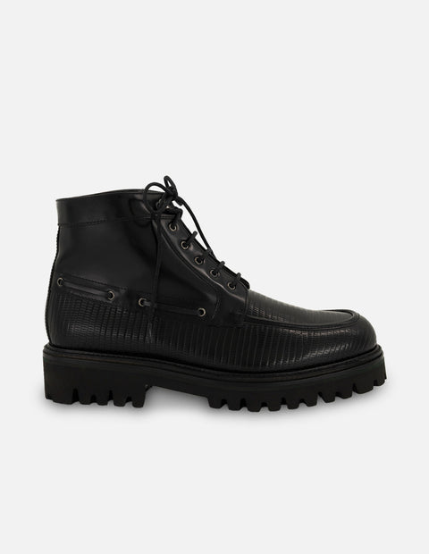 Botines negros de piel grabada tipo tejus para hombre con suela tipo combate