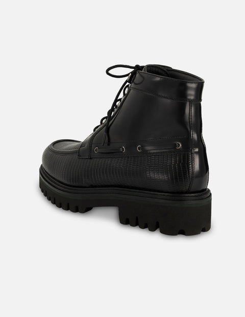 Botines negros de piel grabada tipo tejus para hombre con suela tipo combate