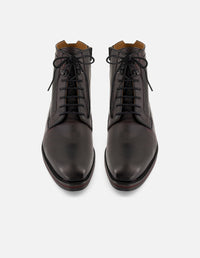 Botines vino de piel para hombre con detalles artesanales