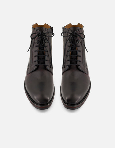 Botines vino de piel para hombre con detalles artesanales