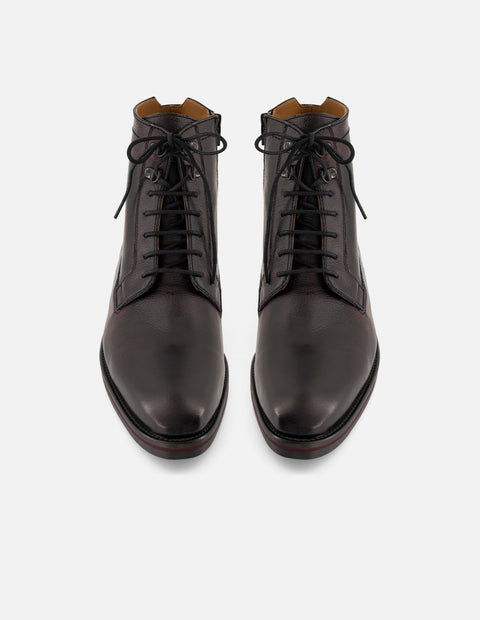 Botines vino de piel para hombre con detalles artesanales