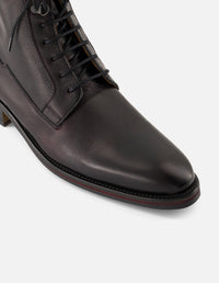 Botines vino de piel para hombre con detalles artesanales