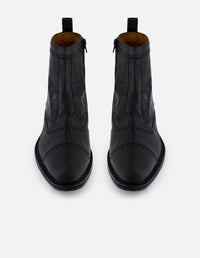 Botines negros en piel tipo coco para hombre con detalles en picado